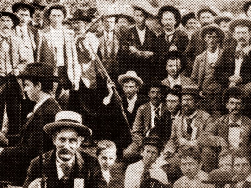 Cypress Mill Rifle Club - Albano in center holding rifle Cypress Mill Rifle Club - Albano in center holding rifle